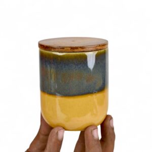 handmade ceramic storage jar with wooden lid